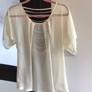 Sheer very light pale yellow blouse